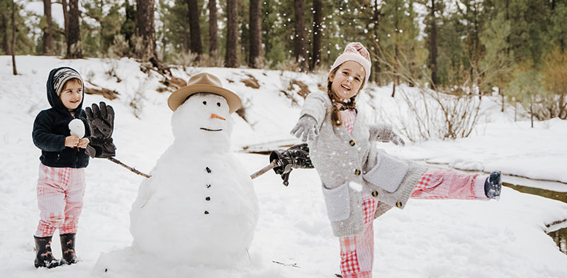 enfant bonhomme neige